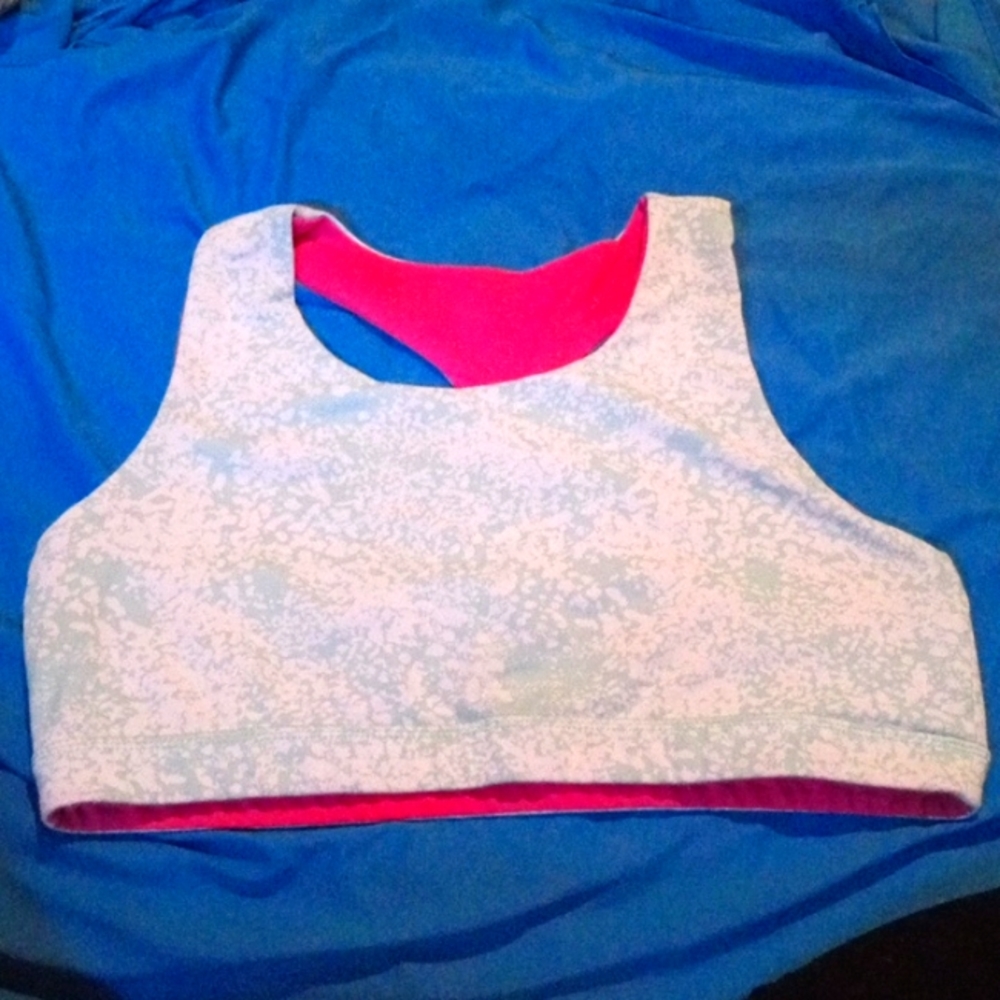 Girls sports bra. Teal and pink.